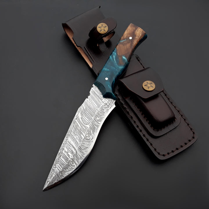 Knife with wooden handle and leather sheath on a dark background