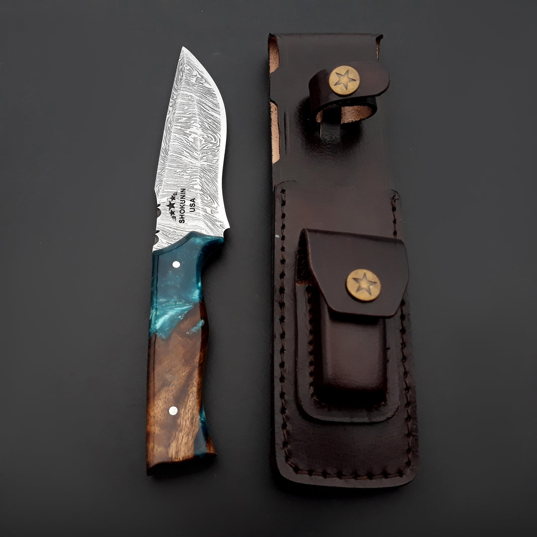 Knife with wooden handle and blue accents next to a leather sheath on a dark background