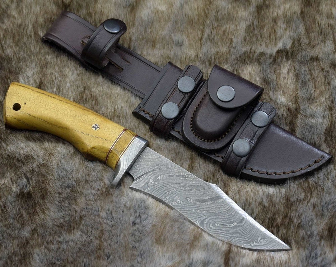 Odyssey Bowie Knives – Odyssey Damascus Hunting Knife with Exotic Yellow Heart Handle – shokuninusa